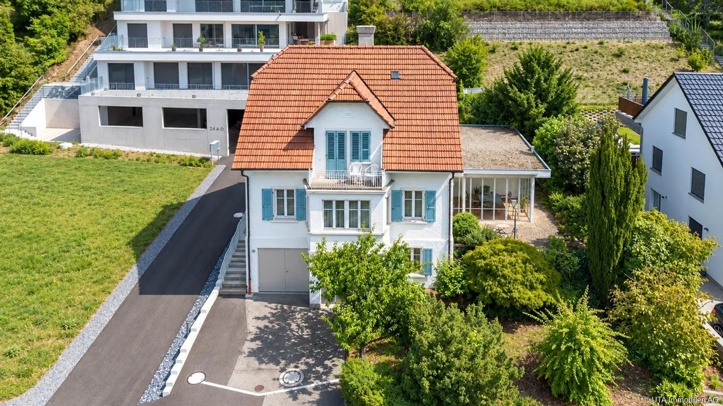 Zweifamilienhaus mit Umbaupotenzial - Foto 1 von 19