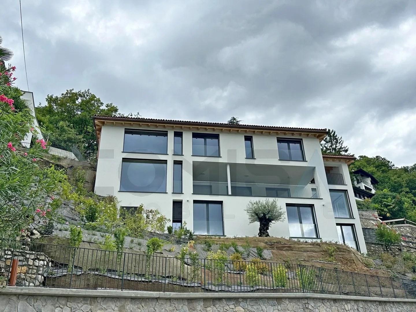 VICO MORCOTE Nuova villa moderna 7.5 locali con vista lago - Foto 1 di 10