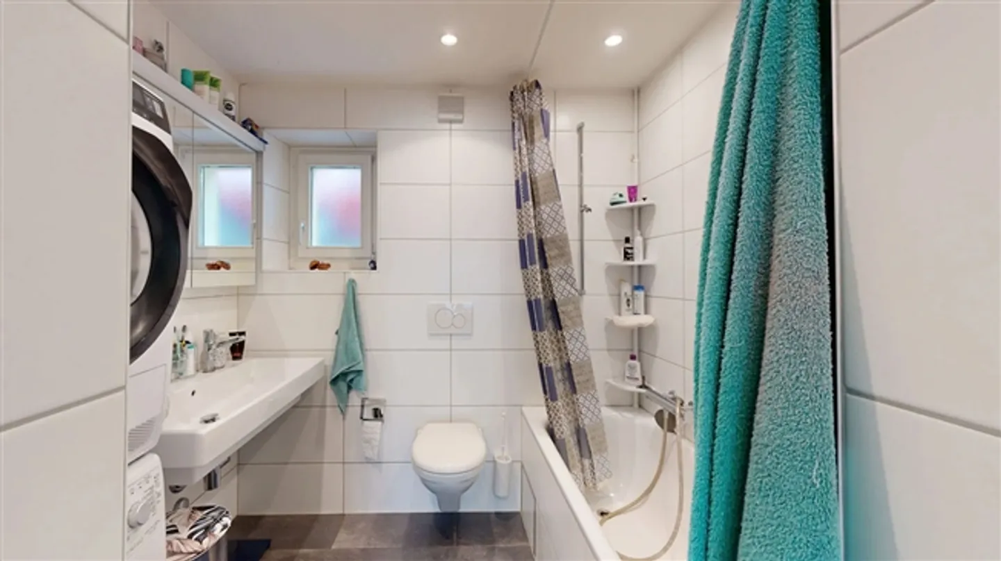 Maison multifamiliale avec six appartements et 5 places de parking extérieures - Photo 12 sur 20