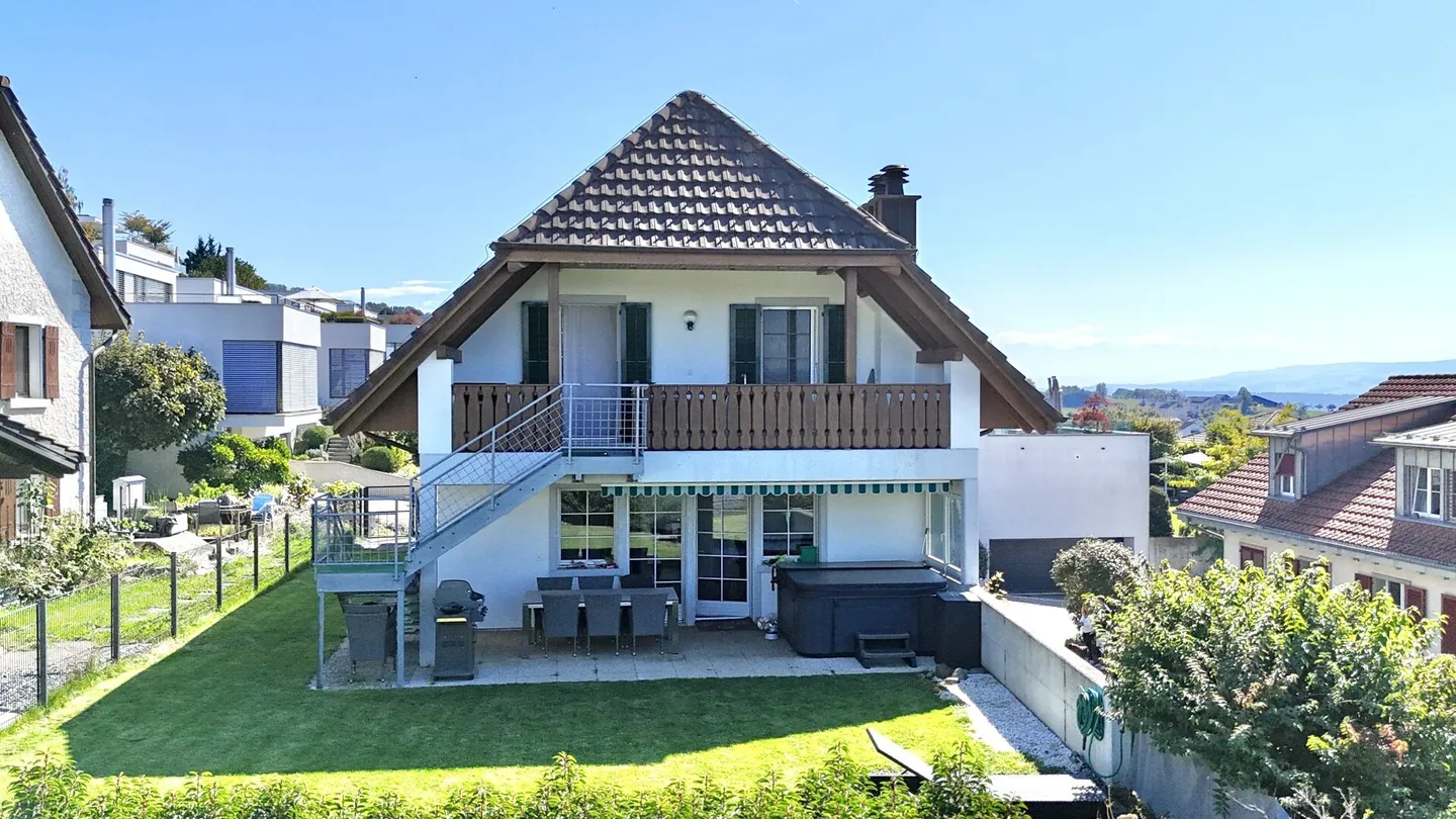 WELL-DESERVED HOME WITH IMPRESSIVE UNDERGROUND GARAGE - Photo 2 of 11