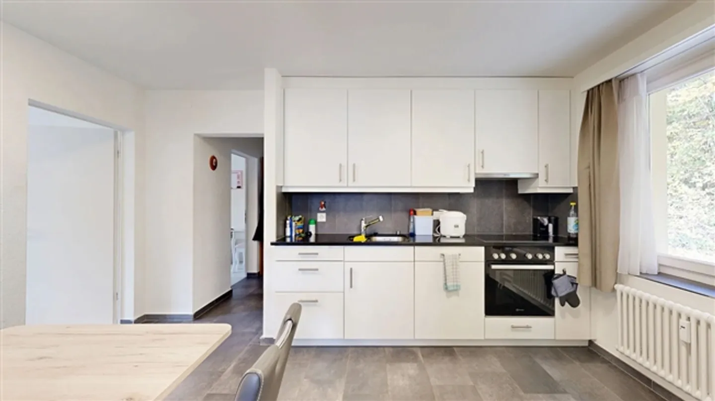 Maison multifamiliale avec six appartements et 5 places de parking extérieures - Photo 15 sur 20