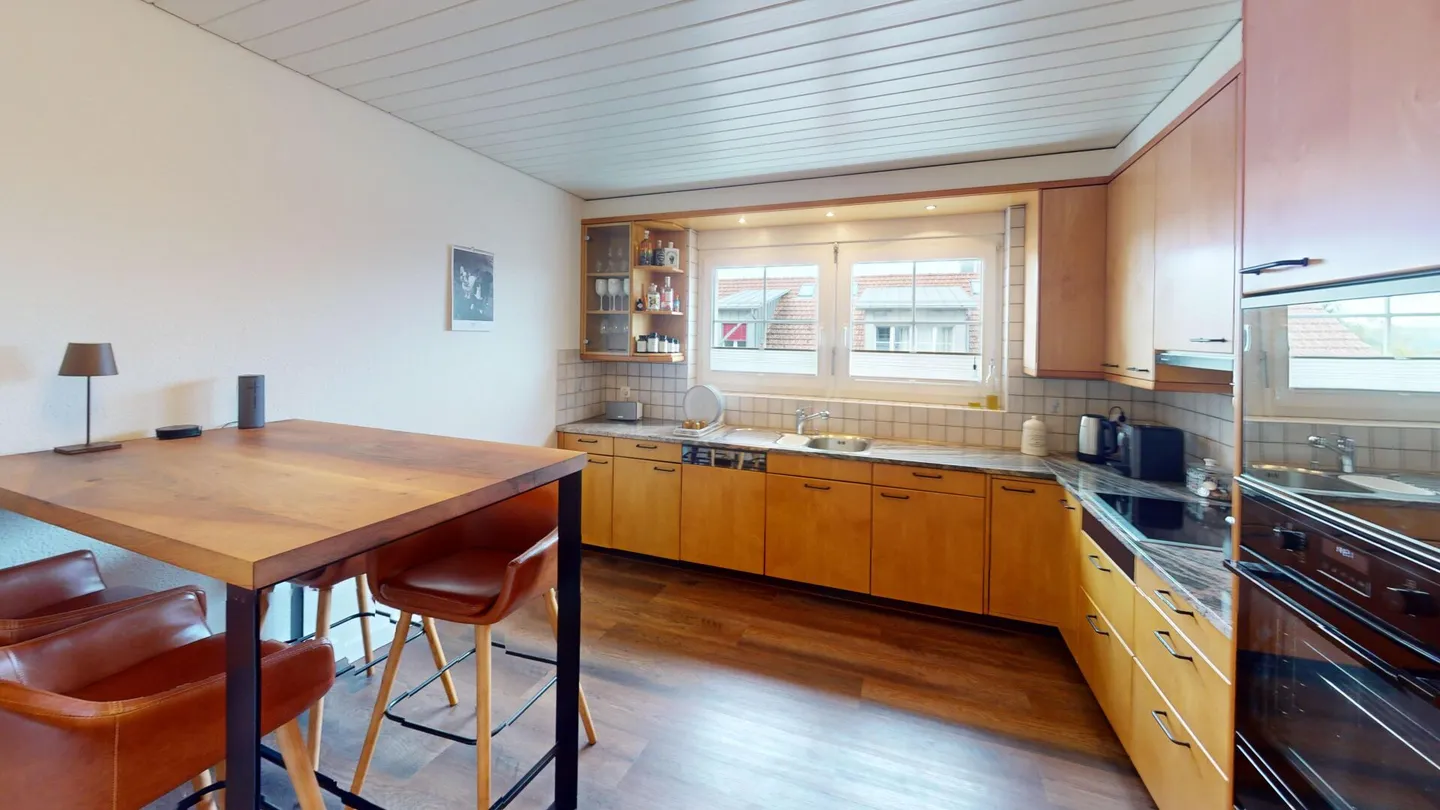 WELL-DESERVED HOME WITH IMPRESSIVE UNDERGROUND GARAGE - Photo 4 of 11