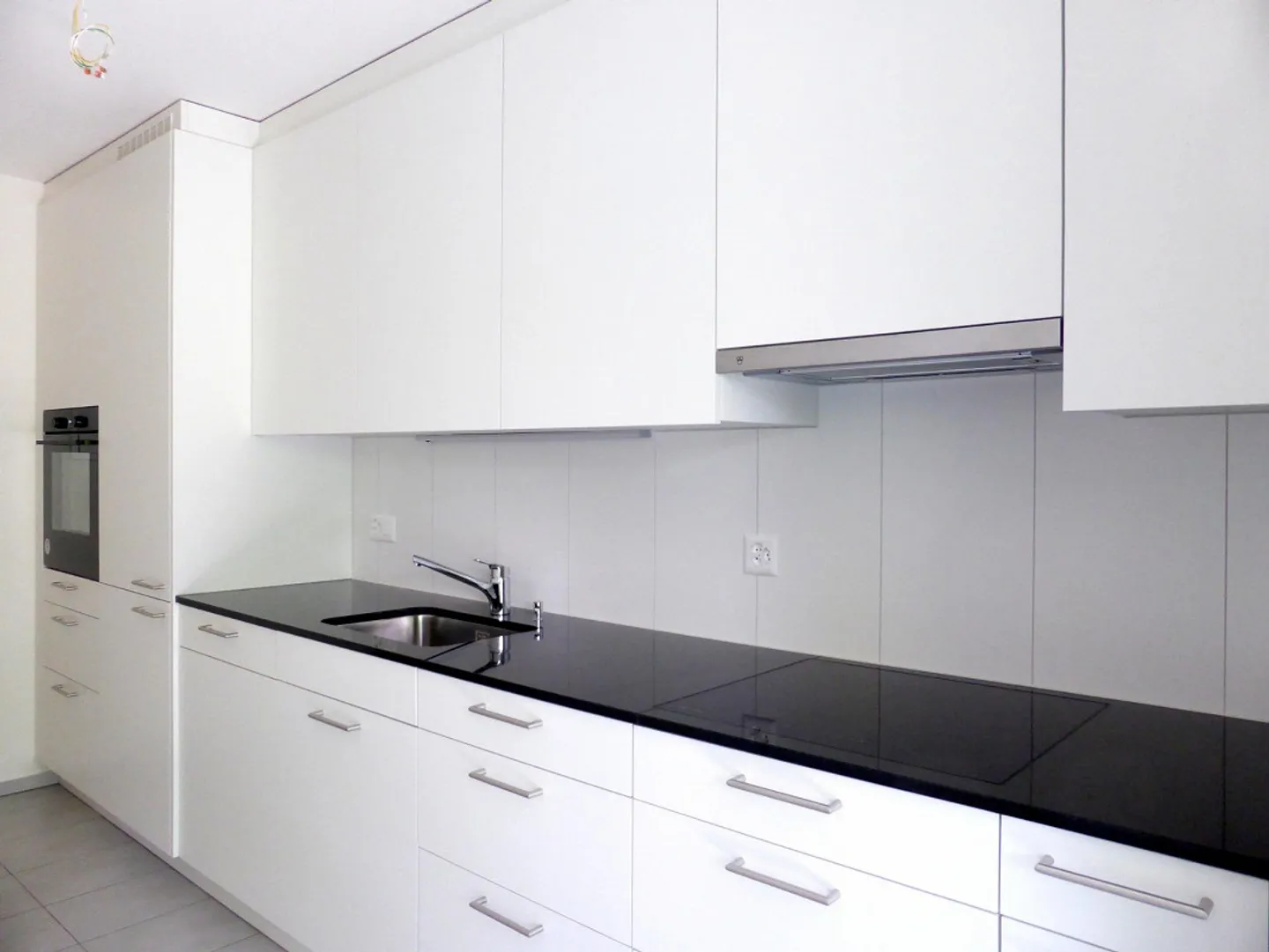 Appartamento al piano terra di 4,5 stanze con patio nel verde - Foto 1 di 13