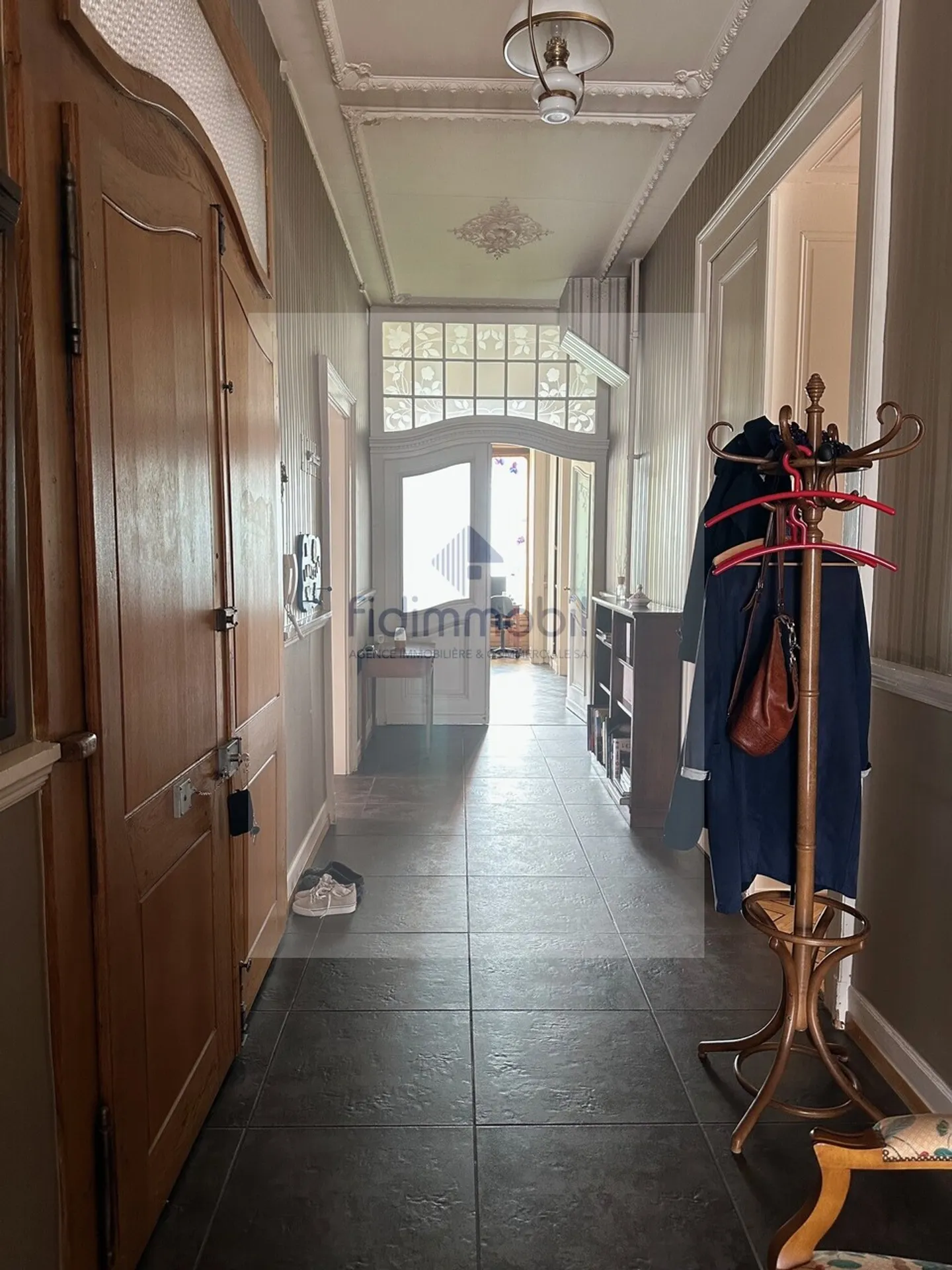 Un appartamento di carattere nel cuore di La Chaux-de-Fonds - Foto 4 di 21