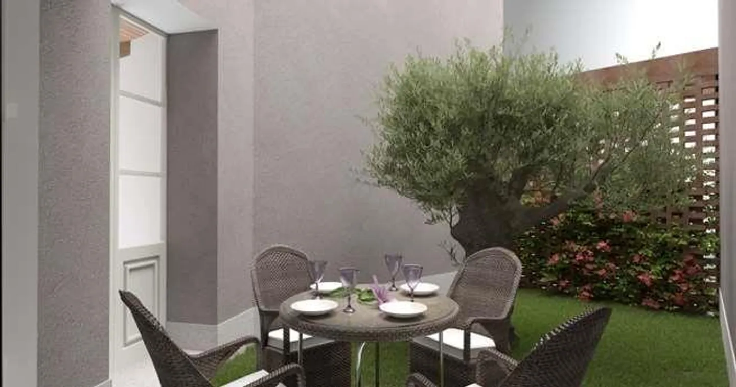Appartement élégant entièrement rénové avec cave rustique - T - Photo 2 sur 5