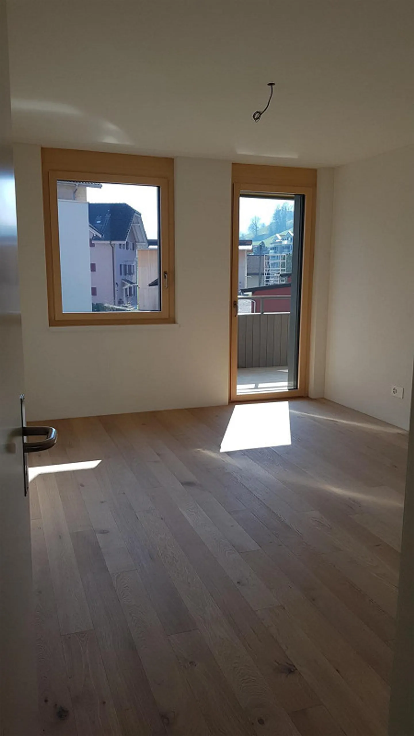 Moderne 4.5-Zimmer-Wohnung mit Balkonen - Foto 9 von 10