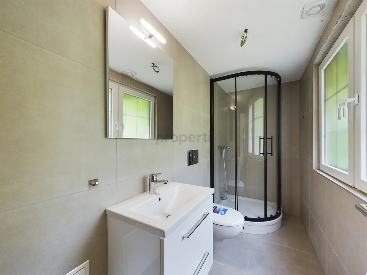 Maison multifamiliale attrayante avec un rendement brut de 5% - Photo 10 sur 11