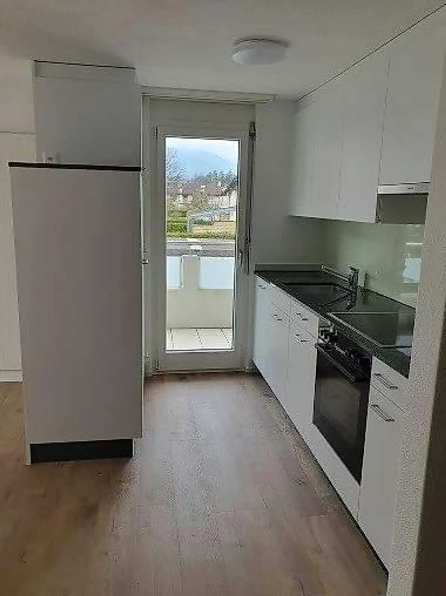 Friendly 2.5 room apartment (1st floor) in a 3-family house - Photo 1 of 3