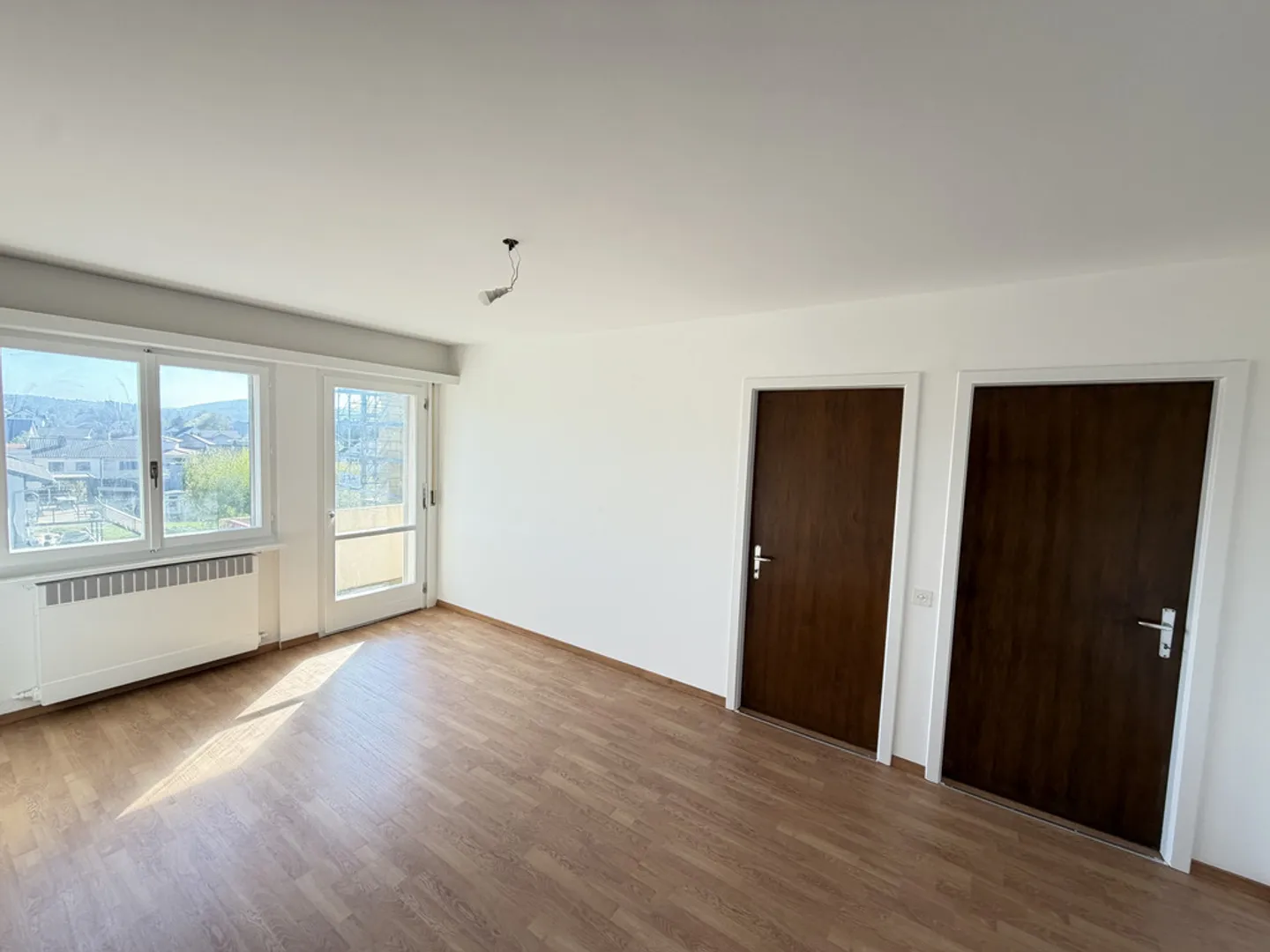 Appartement Charmant dans un Quartier Calme - Photo 3 sur 11