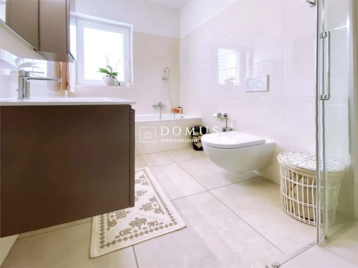 Appartement élégant et spacieux avec terrasse généreuse - Photo 8 sur 13