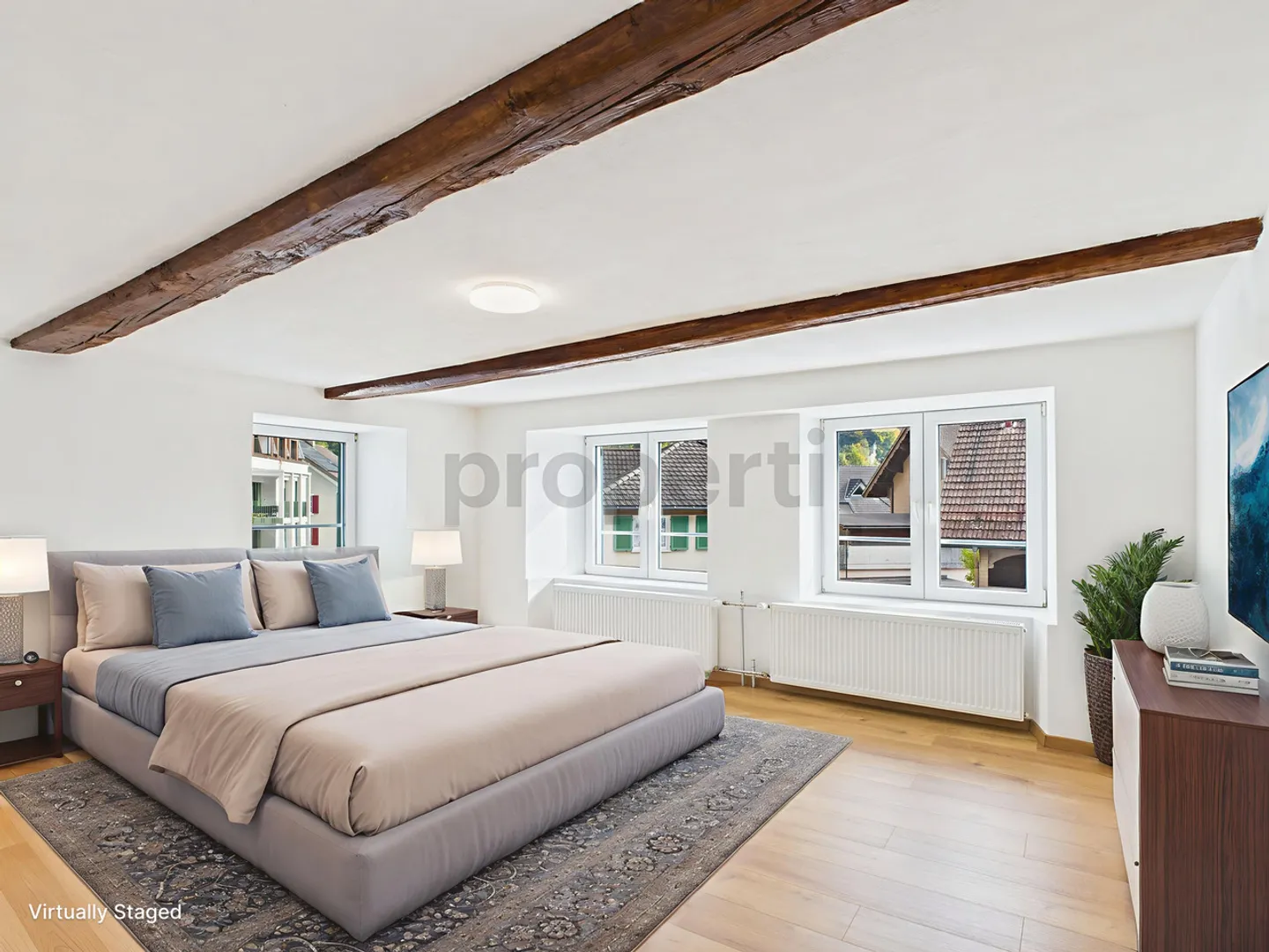 Grosszügiges Eck-Reihenhaus mit Studio, sonnigem Balkon und Bergsicht - Foto 4 von 12