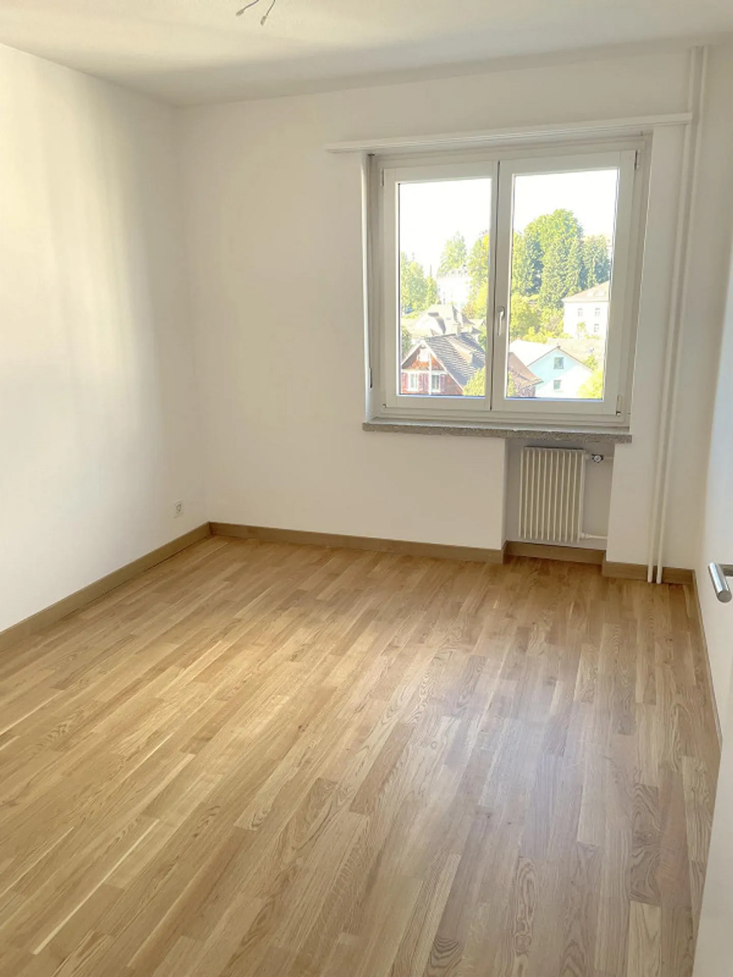 Freshly renovated 3.5 room apartment with a view of greenery - Photo 7 of 13