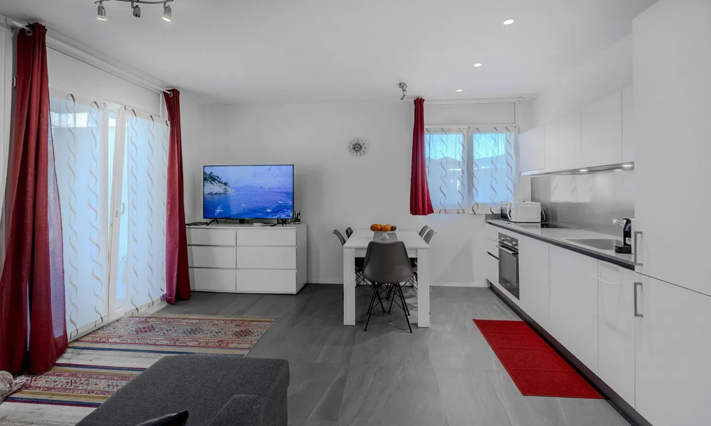 MODERNES 2.5-ZIMMER-APARTMENT MIT GARTEN IN CASLANO - Foto 2 von 10