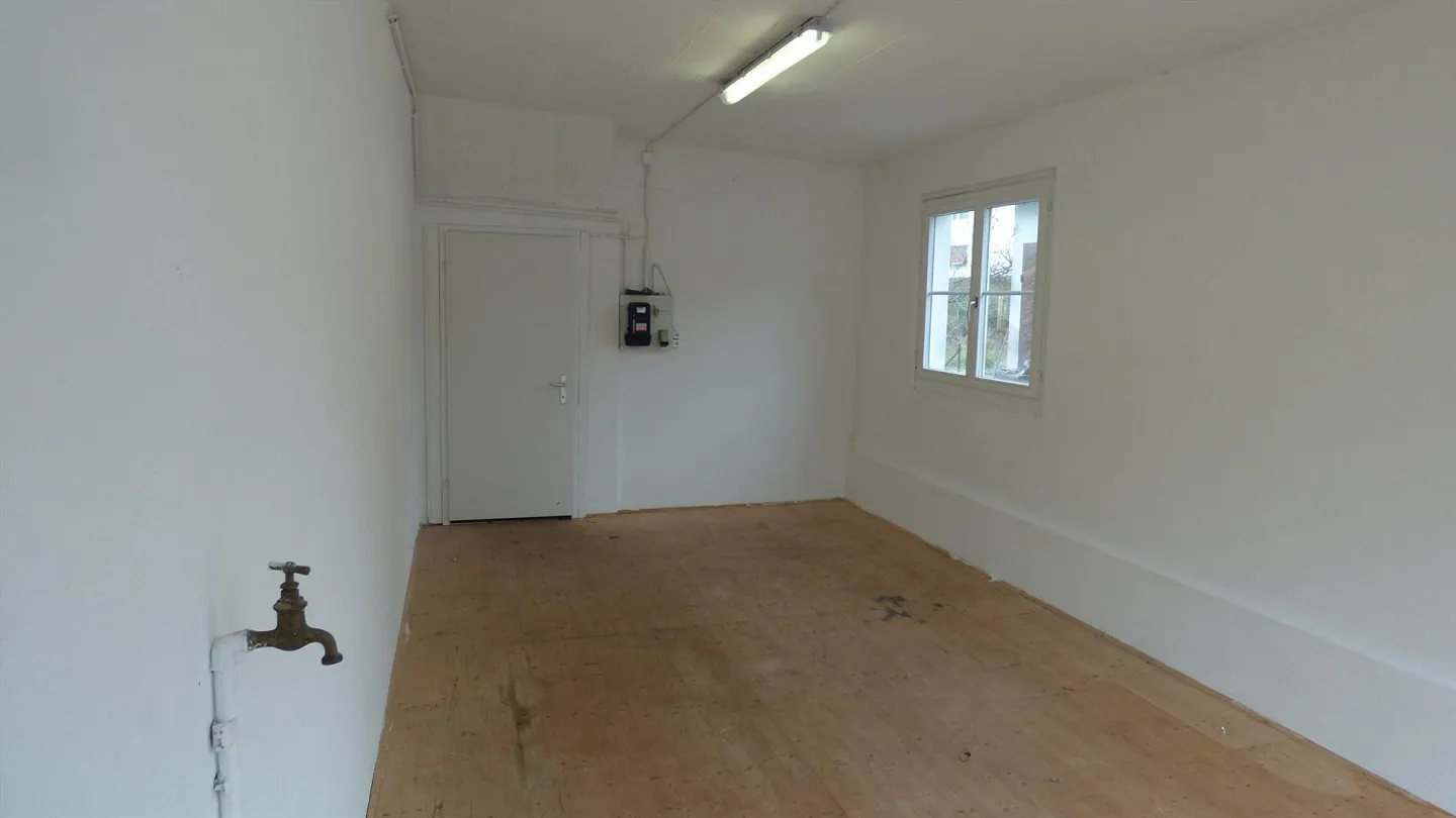 Storage / Hobby / Workshop Room with Display Window - Photo 3 of 4