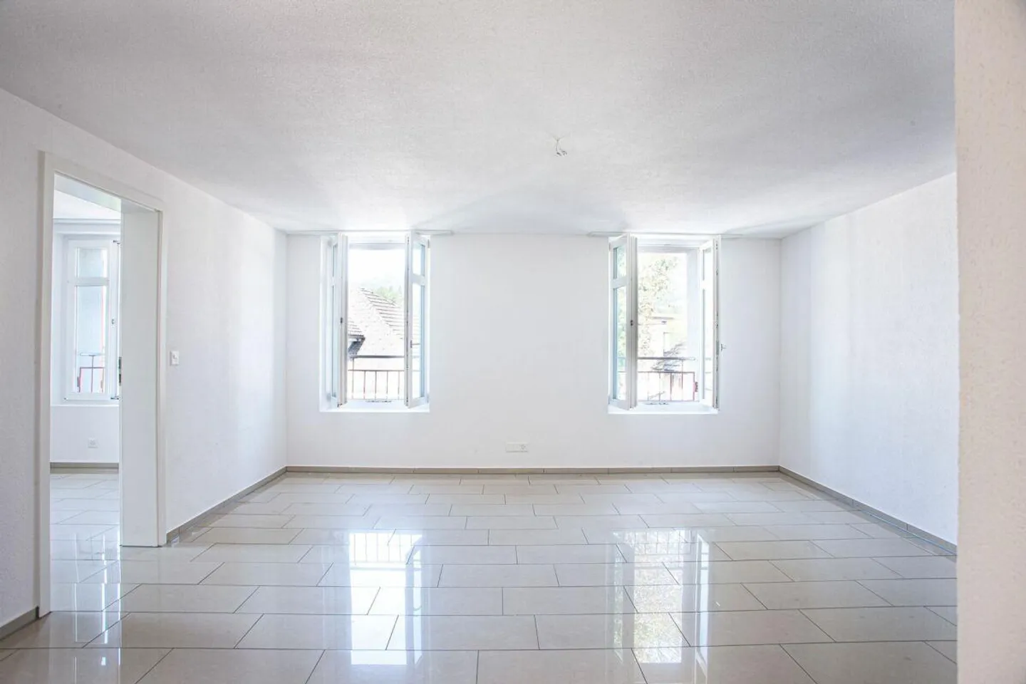 Maison multifamiliale avec espace commercial dans le centre du village de Schüpfheim - Photo 5 sur 10