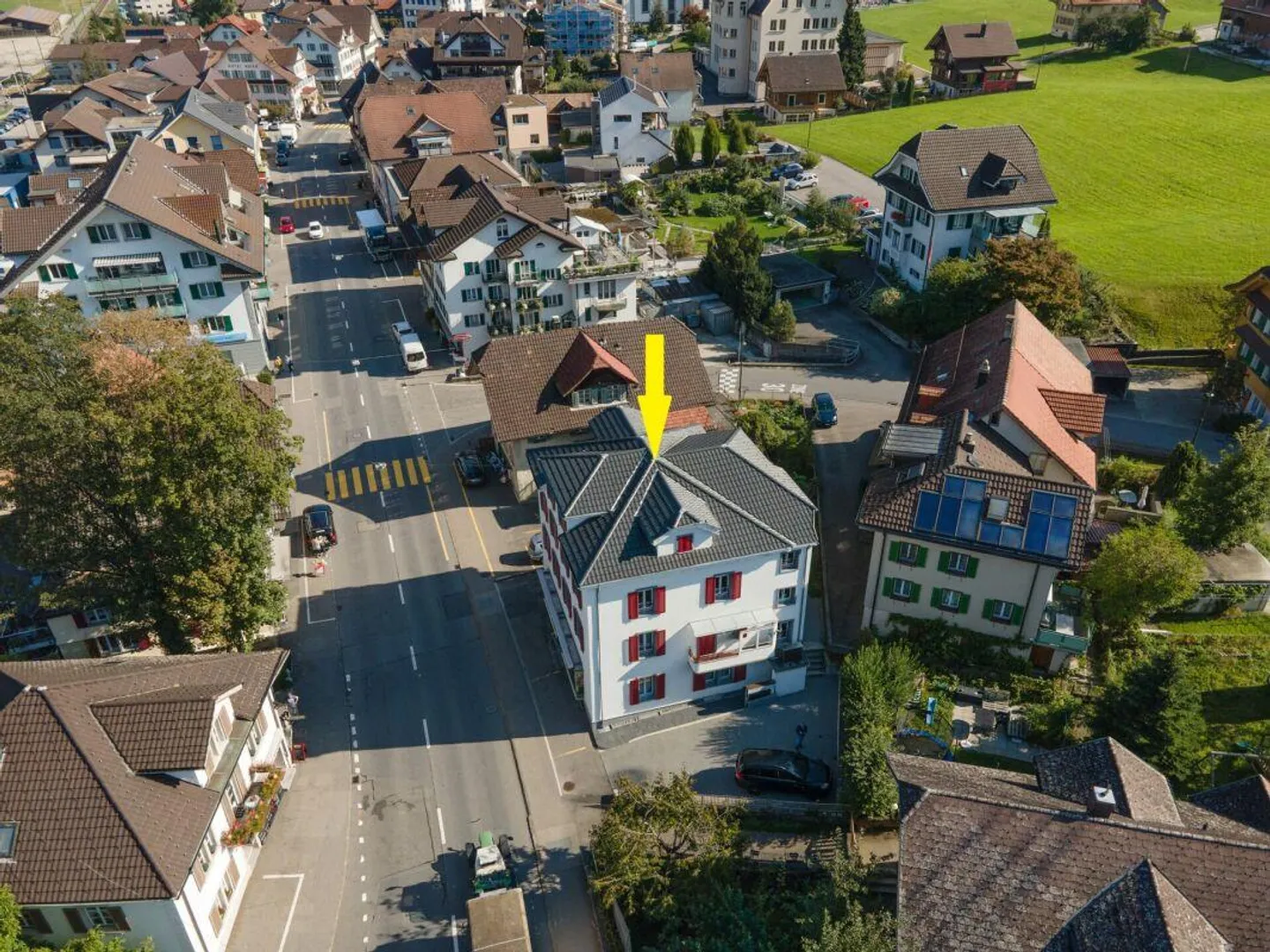 Maison multifamiliale avec espace commercial dans le centre du village de Schüpfheim - Photo 1 sur 10