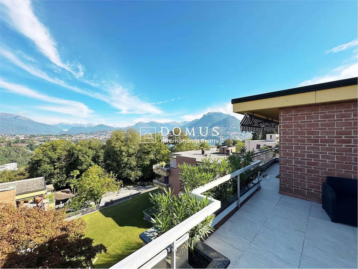 Penthouse avec terrasse vue sur le lac à Pazzallo - Photo 2 sur 13