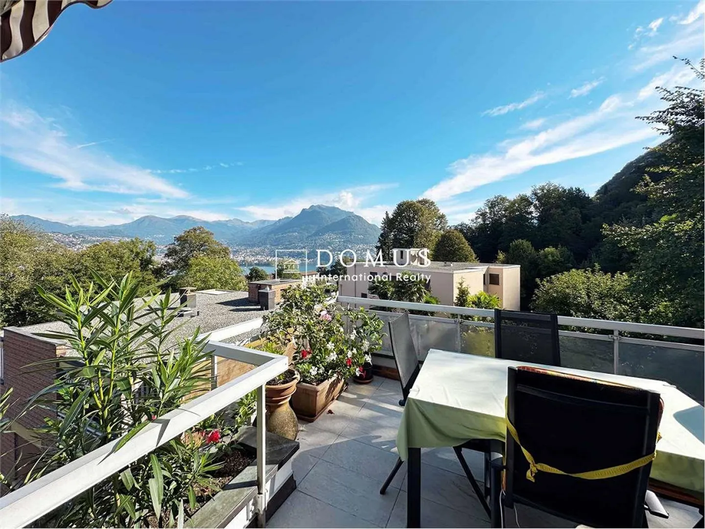 Penthouse avec terrasse vue sur le lac à Pazzallo - Photo 3 sur 13