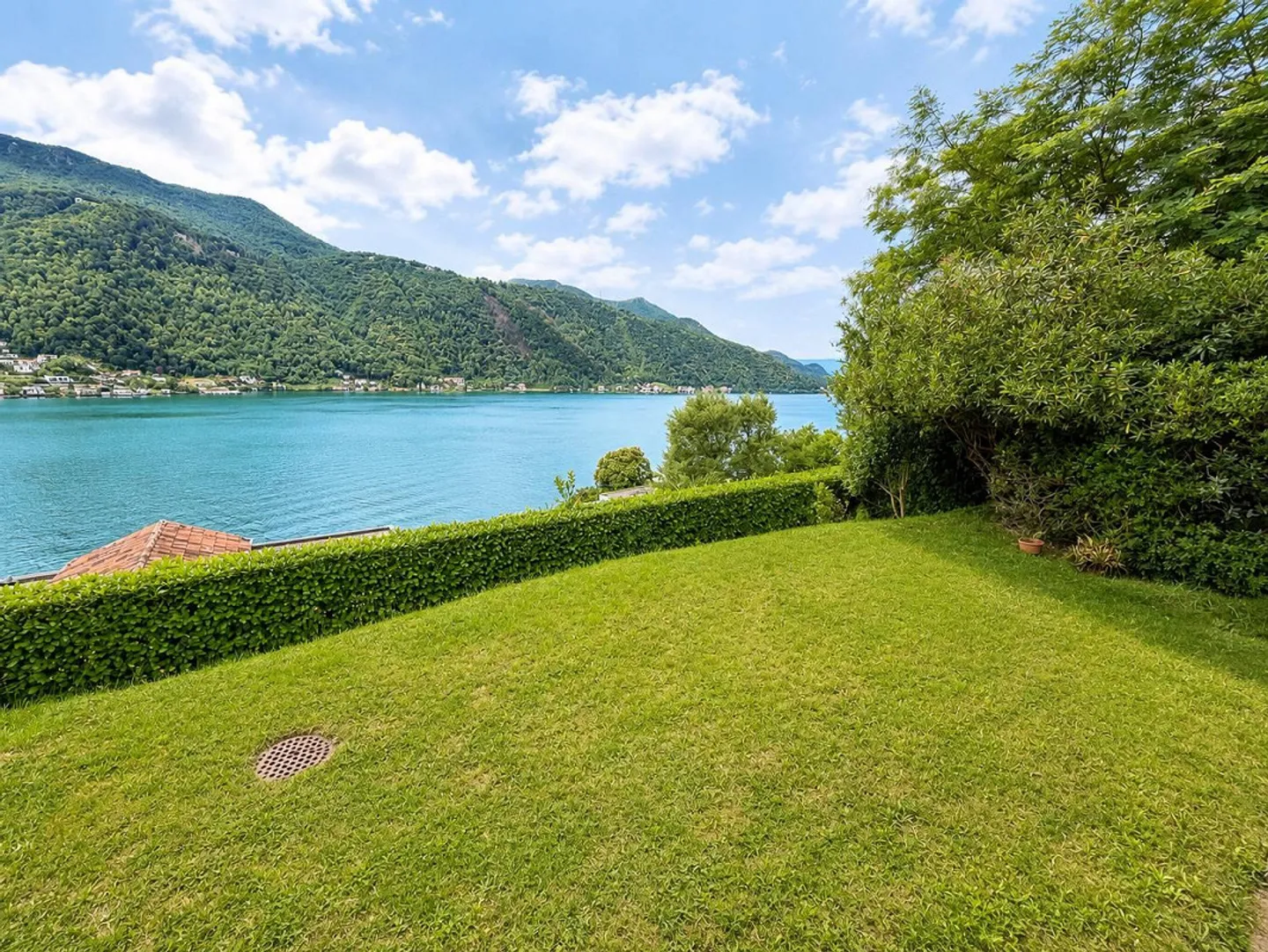 Duplex exclusif avec jardin privé et vue sur le lac - Photo 3 sur 12