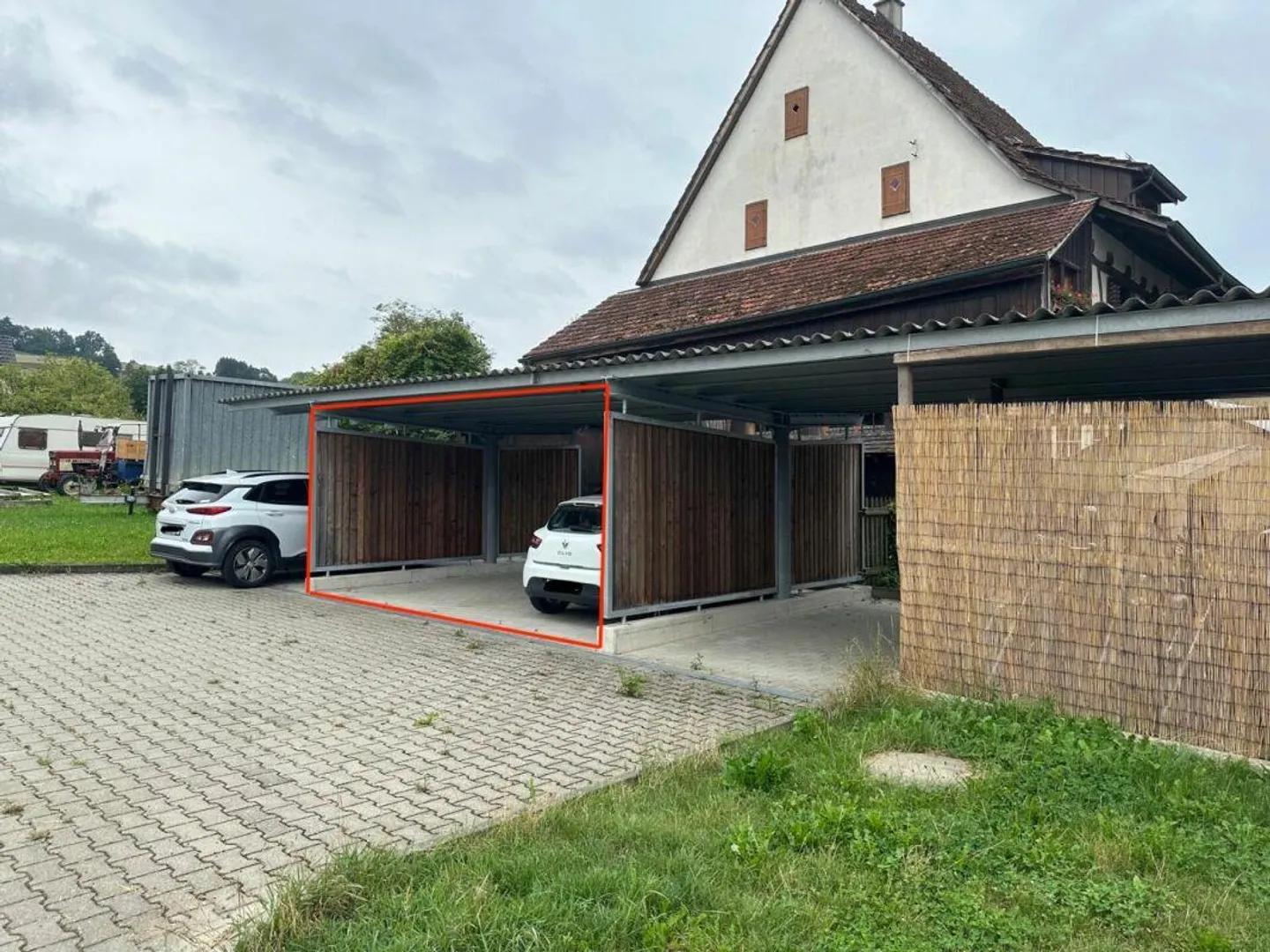 Two covered carport parking spaces - good access and immediately available - Photo 1 of 1