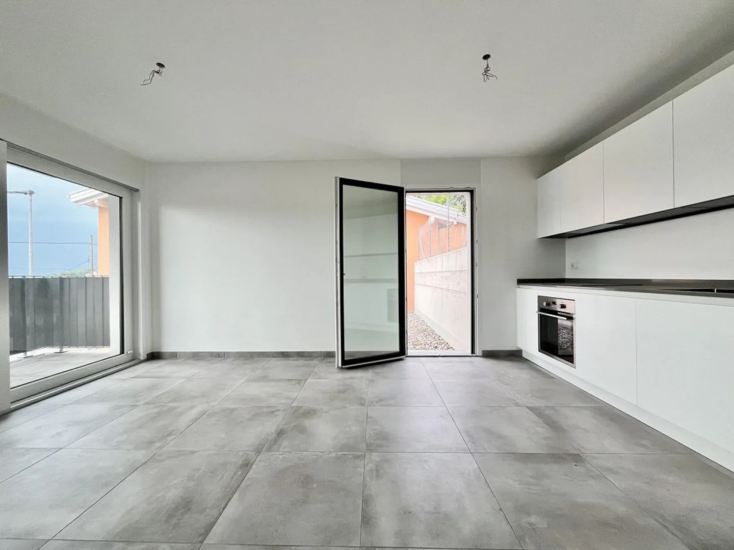 NOUVEL APPARTEMENT 2.5 AU 1ER ÉTAGE AVEC DEUX TERRASSES À TESSERETE - Photo 1 sur 9