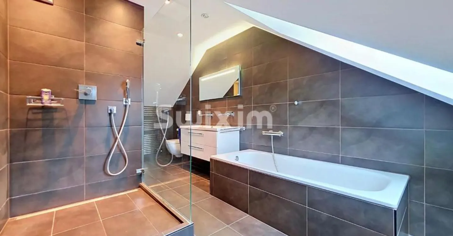 Elegant attic 190 m² in the heart of St-Cergue - Photo 6 of 7