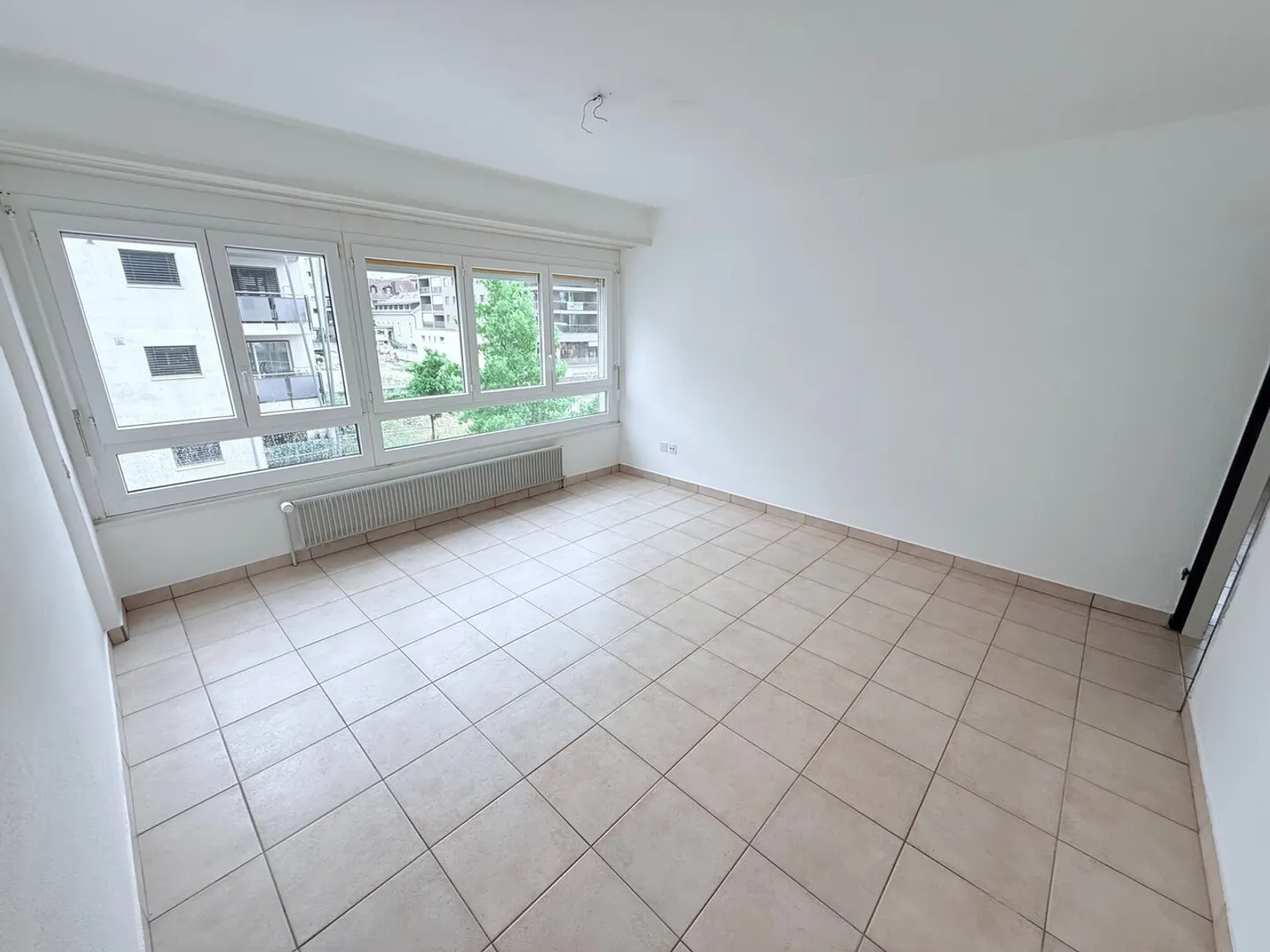 Charmant appartement 3.5 pièces - Photo 2 sur 7