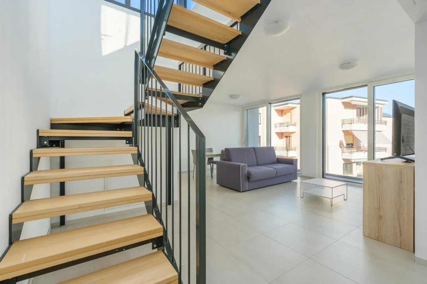 AGNO · 2.5 CHAMBRES DESIGN AVEC TOIT TERRASSE PANORAMIQUE - Photo 9 sur 11