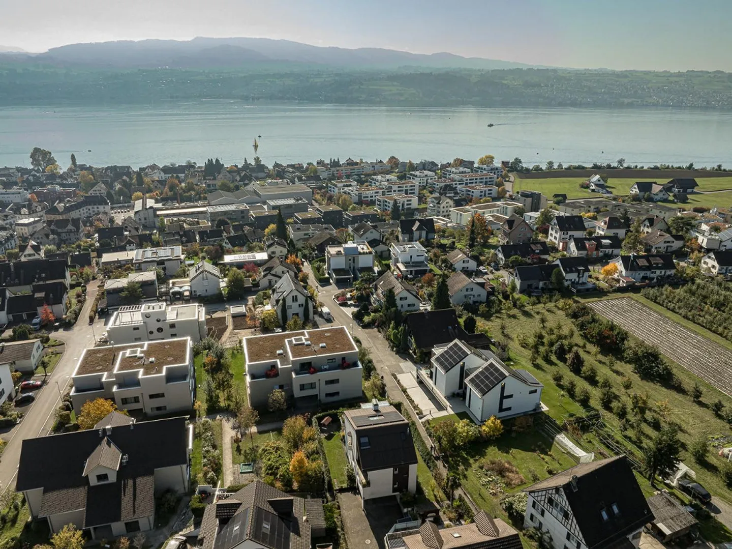 Appartement en duplex de 4,5 pièces dans un emplacement calme avec vue partielle sur le lac - Photo 12 sur 13