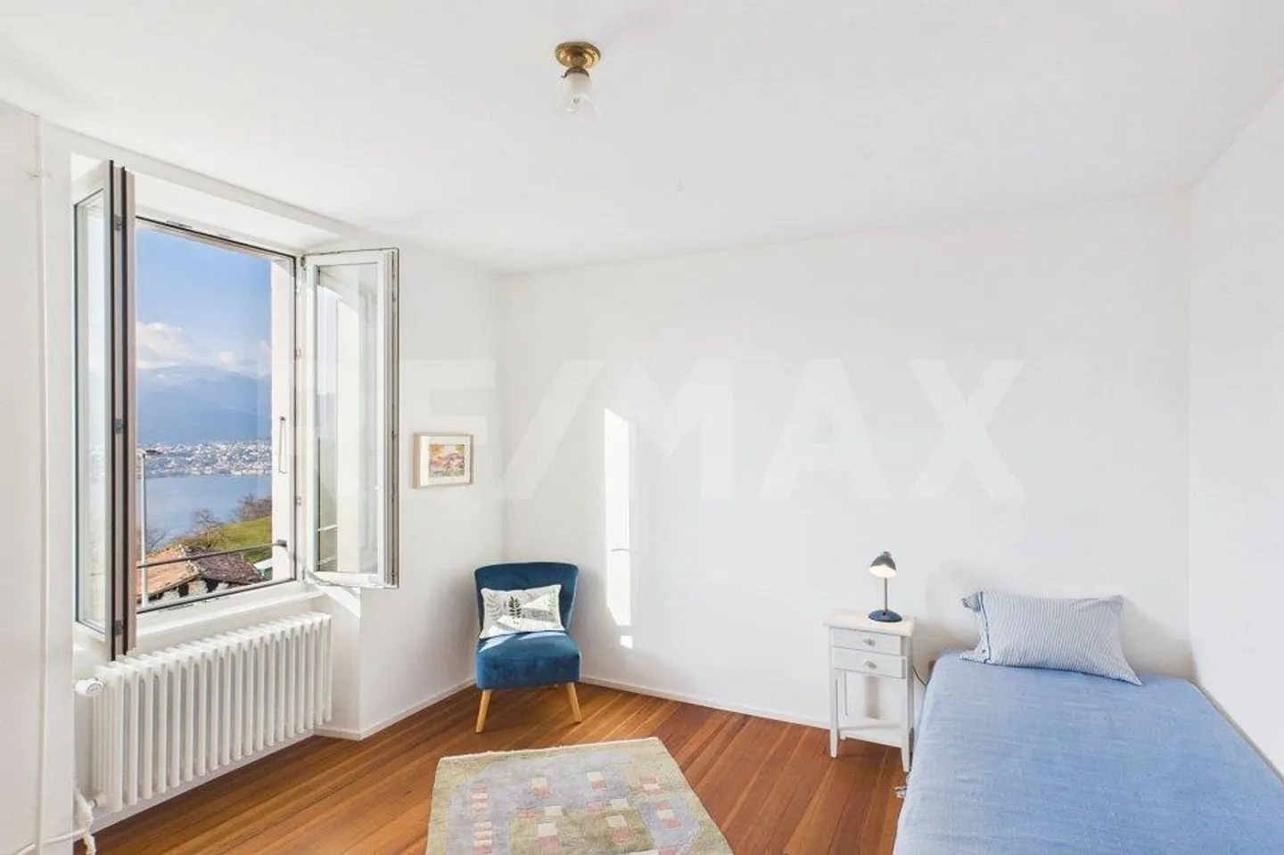 Penthouse spacieux, vue imprenable sur le lac, jardin et à 25 minutes de Lugano ! - Photo 5 sur 8