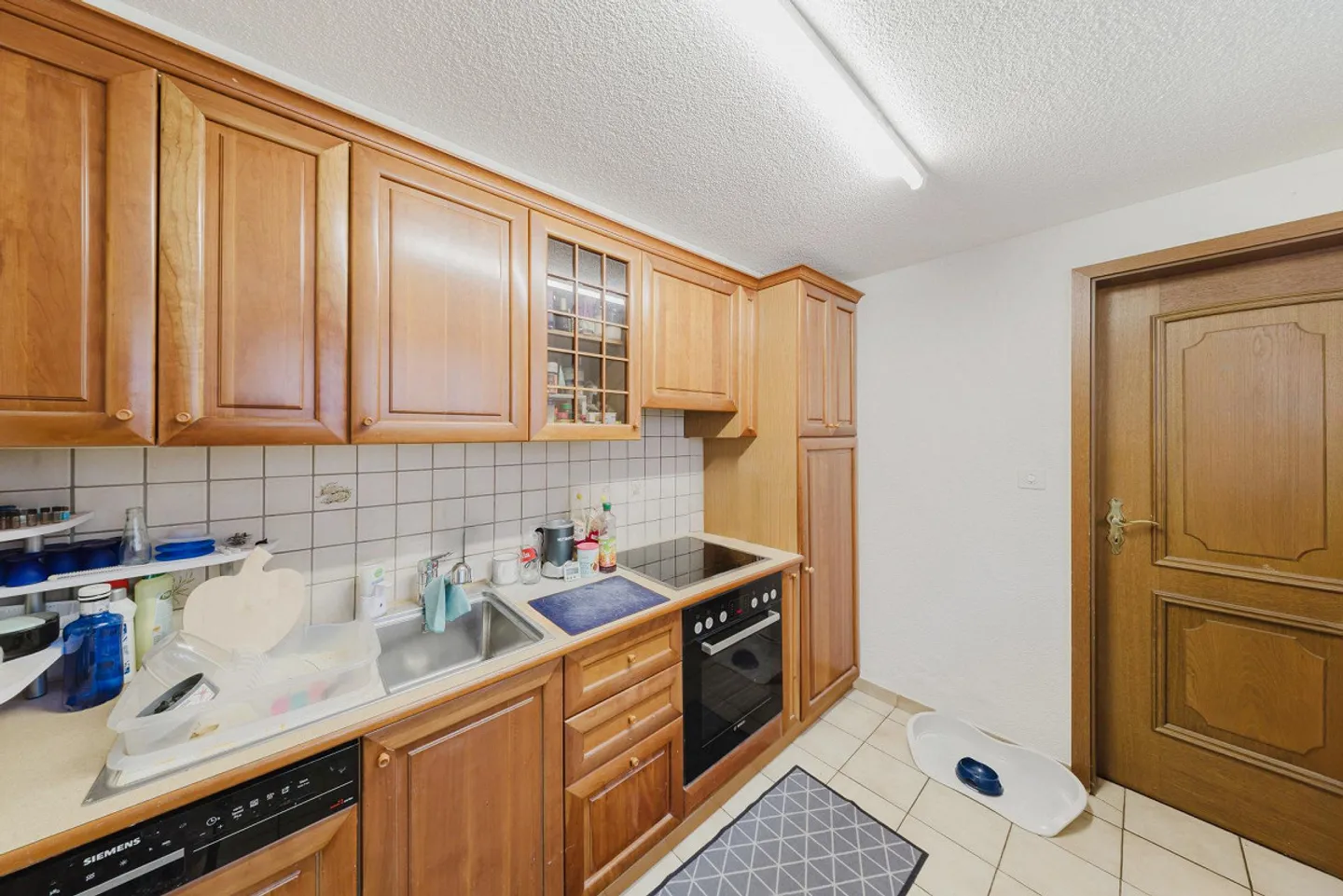 Einfamilienhaus mit Einliegerwohnung zentral in Oberuzwil - Foto 13 von 17