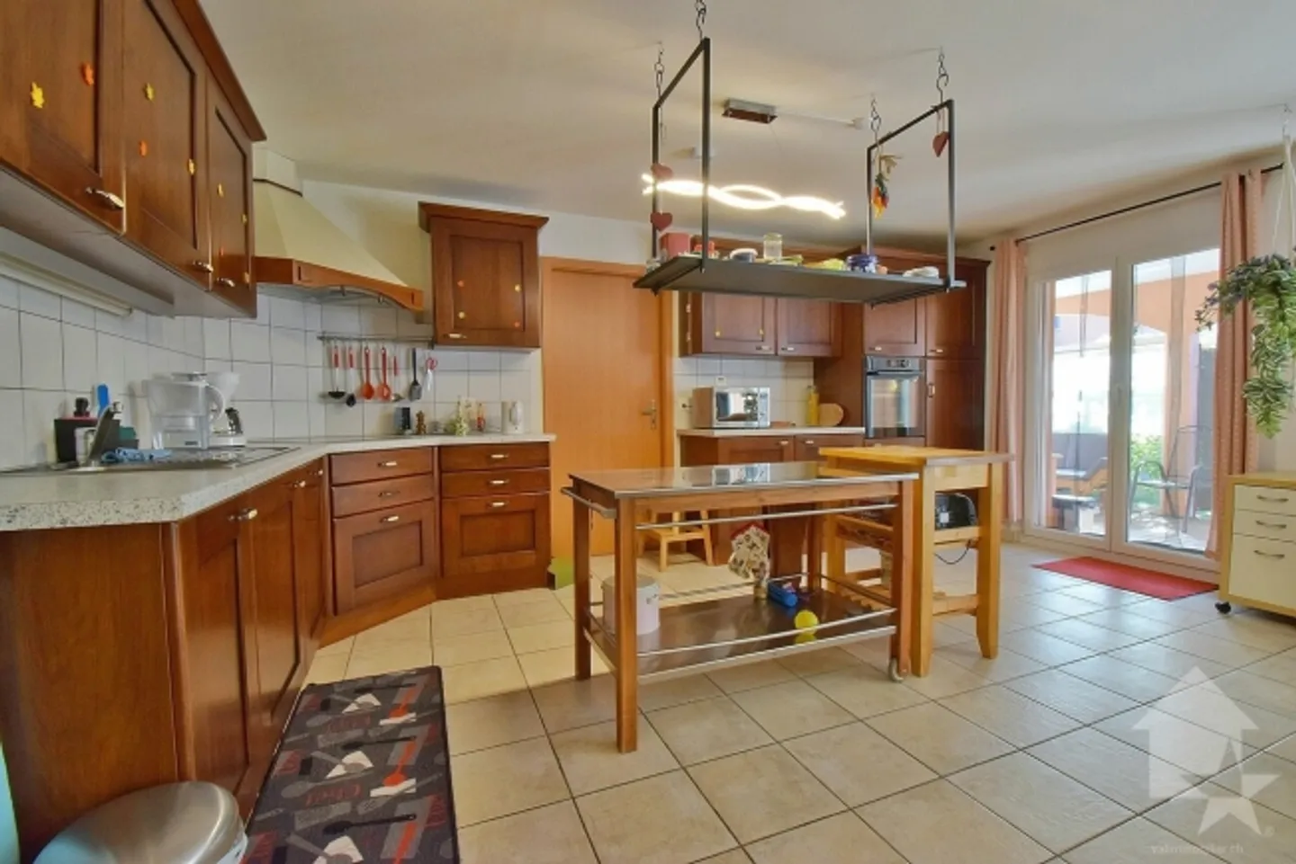 Spacious 4.5-room apartment with 2 parking spaces included - Photo 5 of 17
