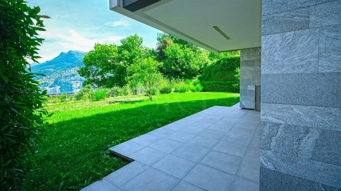 Paradiso - Appartamento 5.5 locali di pregio con giardino e vista lago - Foto 1 di 13