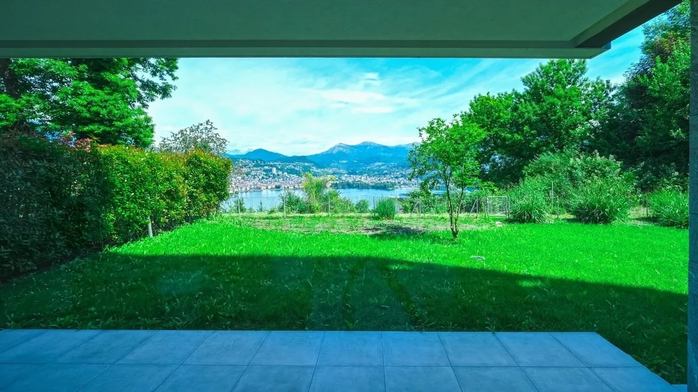 Paradiso - Appartamento 5.5 locali di pregio con giardino e vista lago - Foto 2 di 13