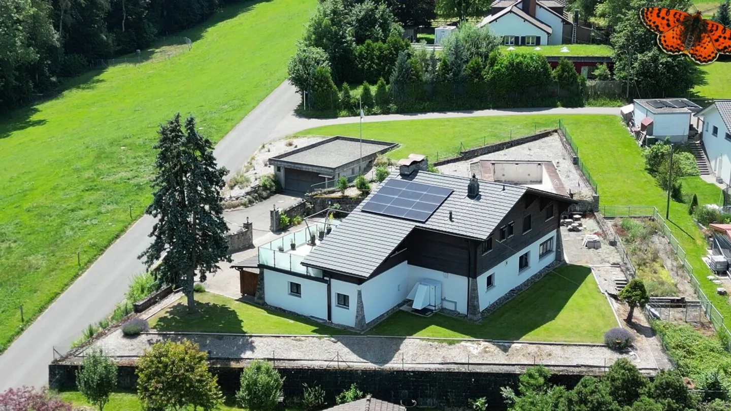 Eigentum von zwei Wohnungen mit großem Garten! - Foto 1 von 4