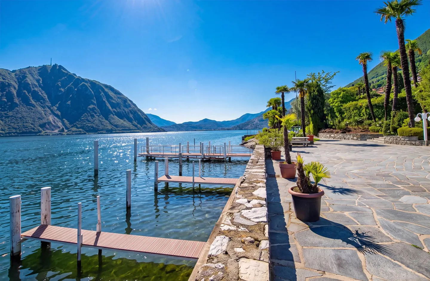 PRATICO BILOCALE RINNOVATO CON VISTA LAGO A BISSONE - Photo 10 of 11