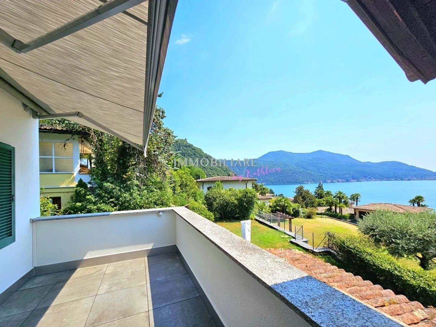 Wohnung in einer Villa im ersten Stock mit schöner Terrasse und Seeblick - Foto 1 von 13