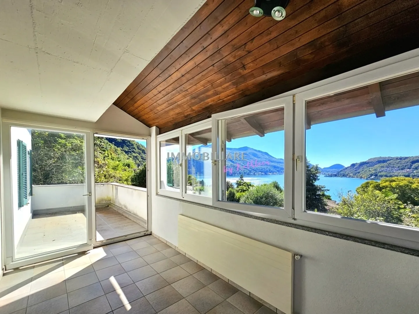 Wohnung in einer Villa im ersten Stock mit schöner Terrasse und Seeblick - Foto 12 von 13