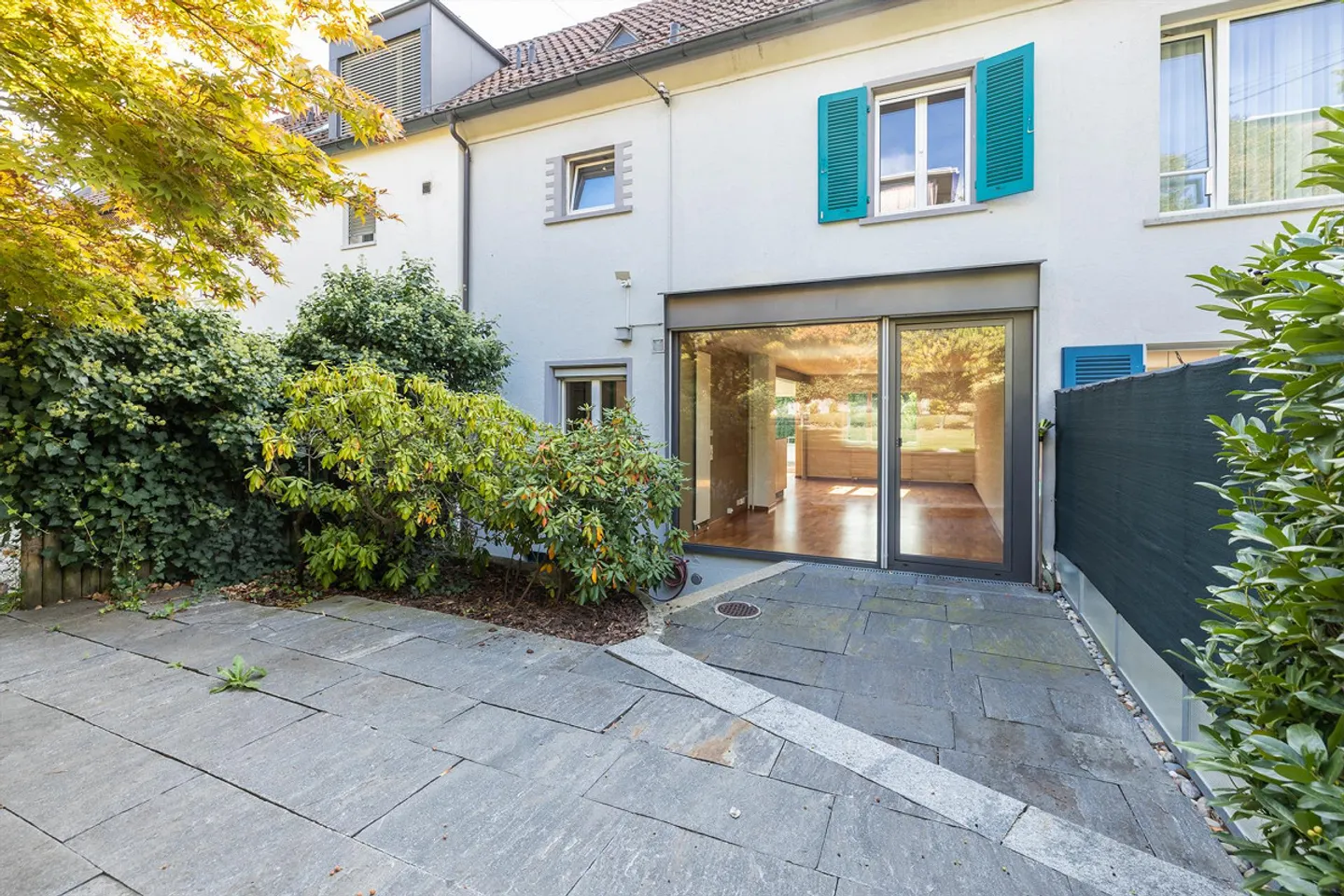 Familienhaus mit Garten-Oase - Foto 1 von 13