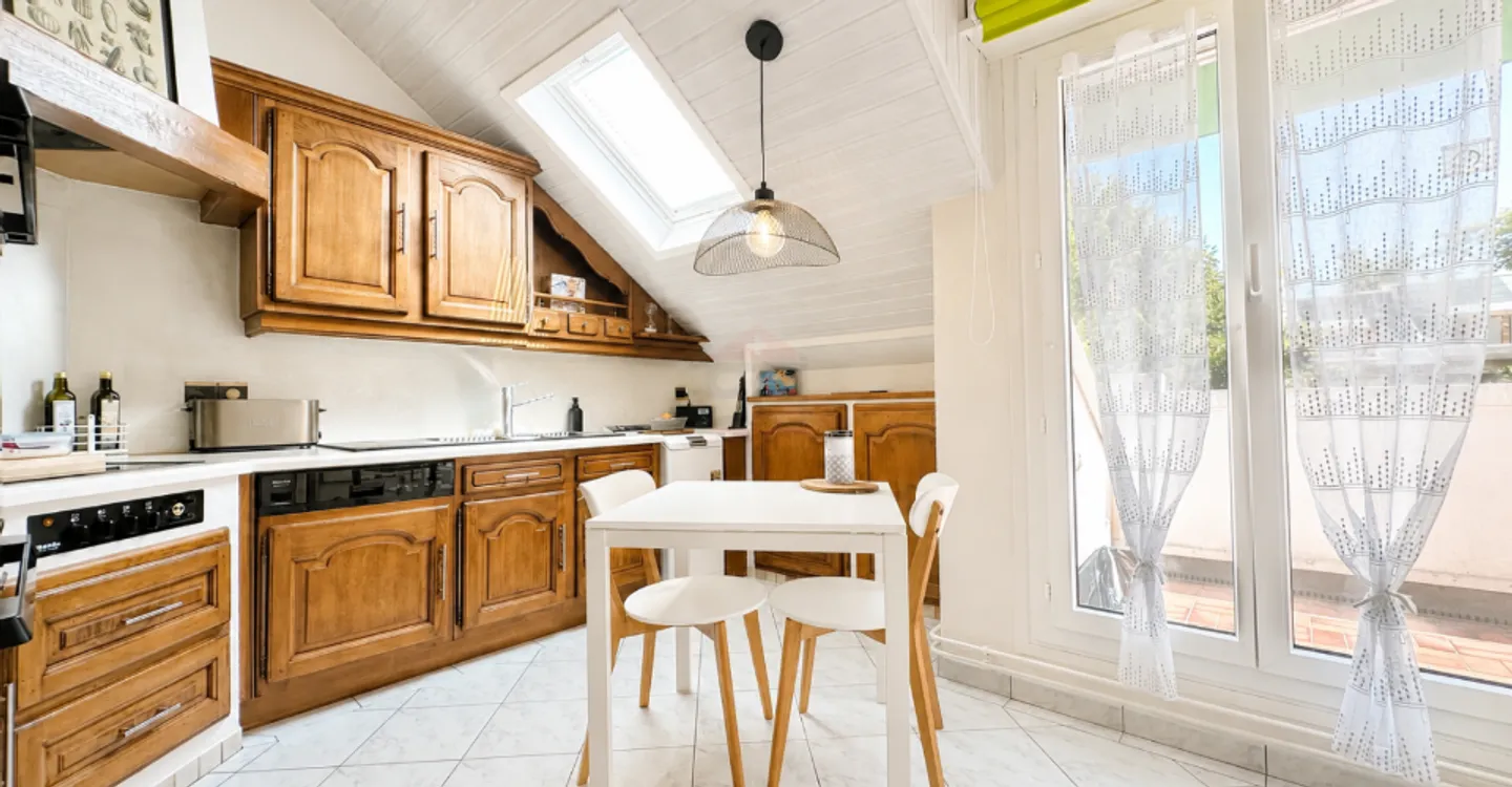 4-room penthouse of 113 m² in the center of Bernex - Photo 5 of 8