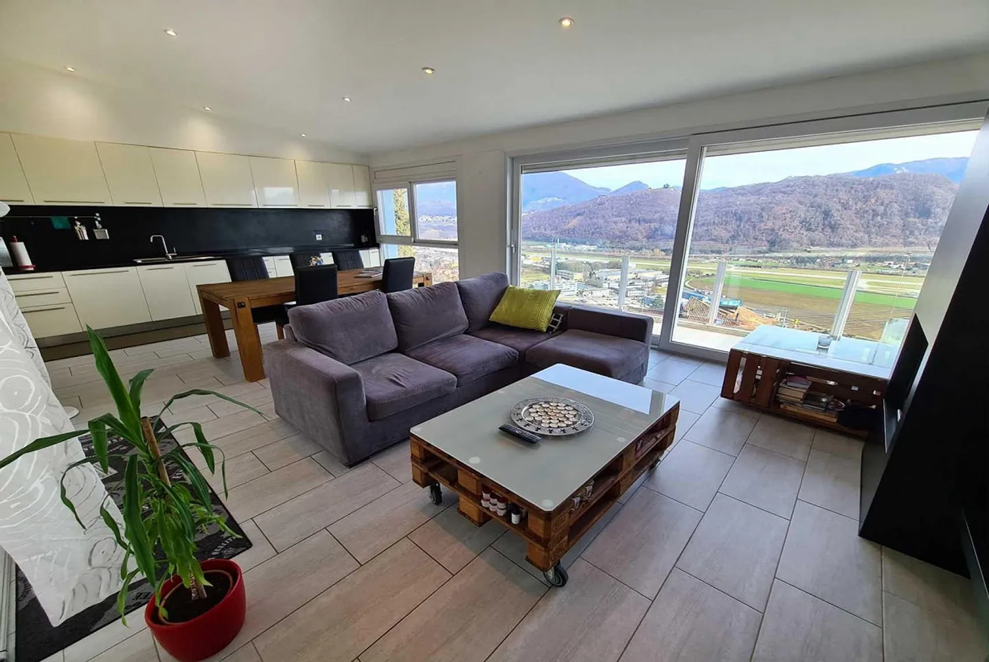 SPACIOUS ATTIC 5.5 WITH LARGE TERRACE LAKE VIEW IN BIOGGIO - Photo 1 of 11