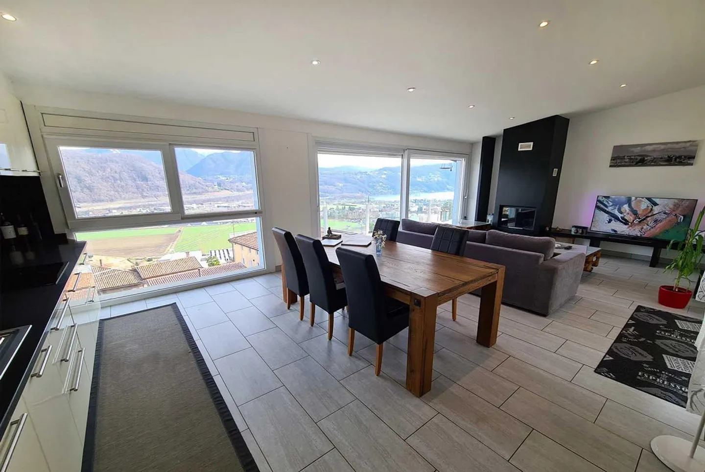 SPACIOUS ATTIC 5.5 WITH LARGE TERRACE LAKE VIEW IN BIOGGIO - Photo 3 of 11