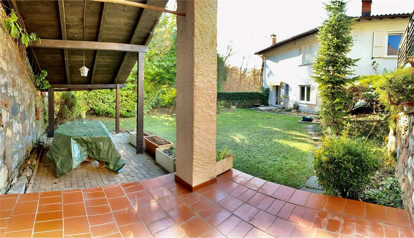 Appartement de 4,5 pièces avec jardin privé à Pazzallo - Photo 1 sur 12