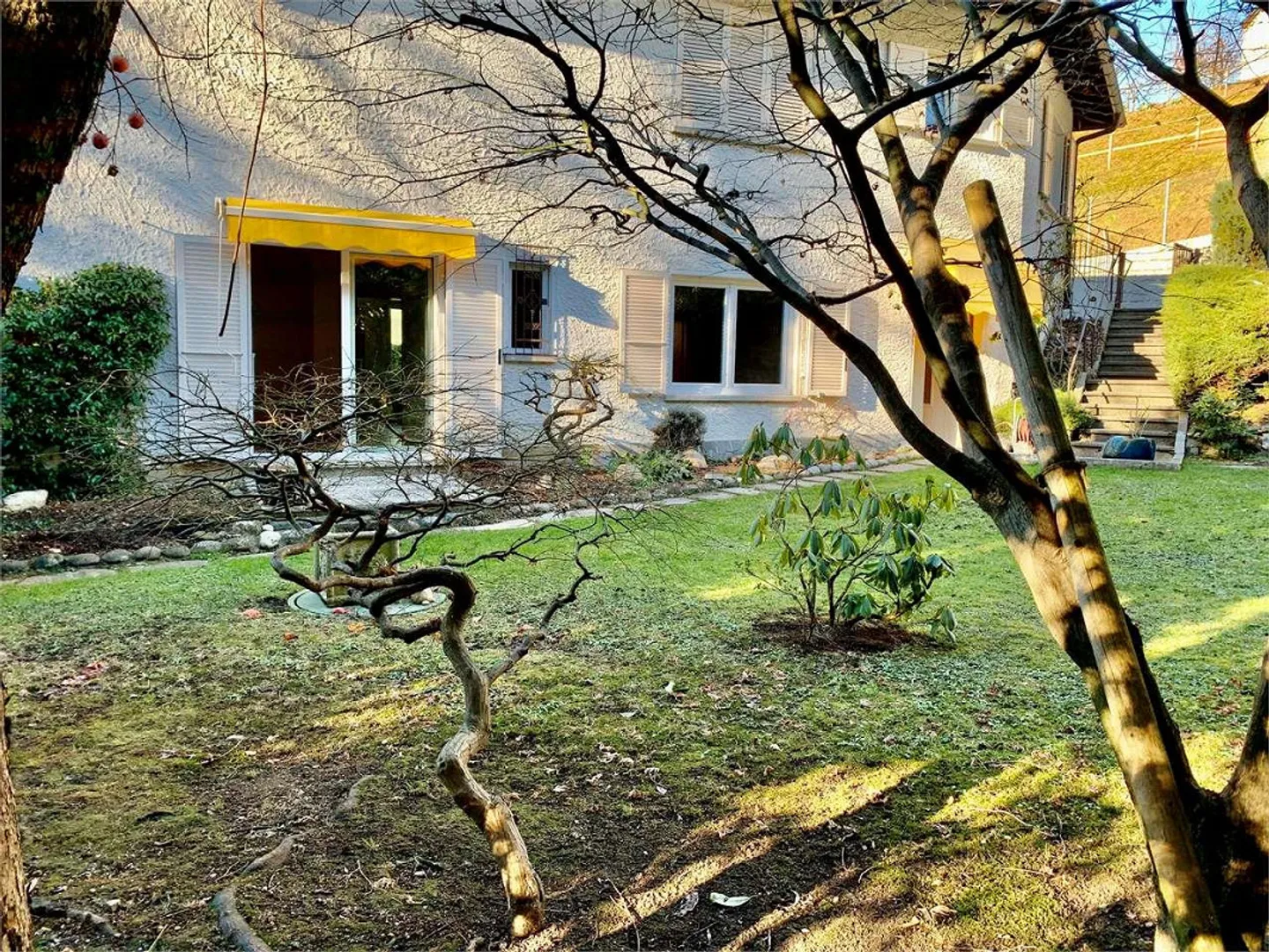 Appartement de 4,5 pièces avec jardin privé à Pazzallo - Photo 2 sur 12