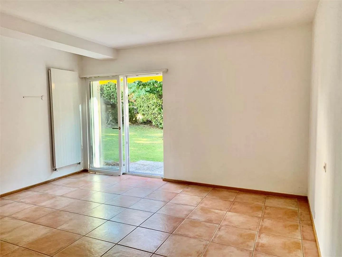 Appartement de 4,5 pièces avec jardin privé à Pazzallo - Photo 4 sur 12