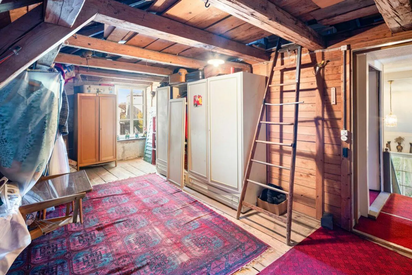 Maison multifamiliale avec dépendance et jardin au centre de Pfäffikon - Photo 13 sur 20