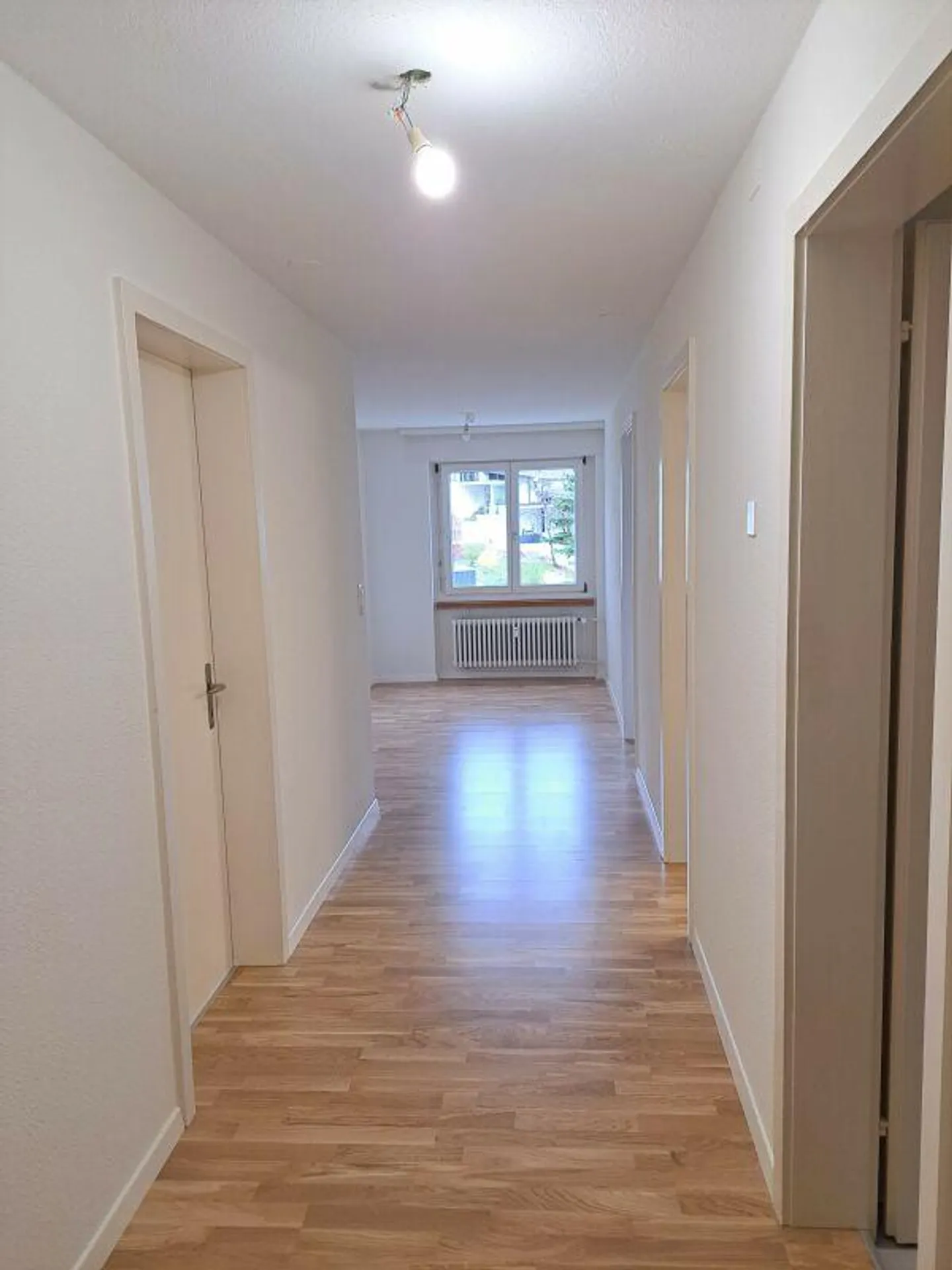 Appartement lumineux avec grand balcon et vue dégagée sur la verdure - Photo 5 sur 9
