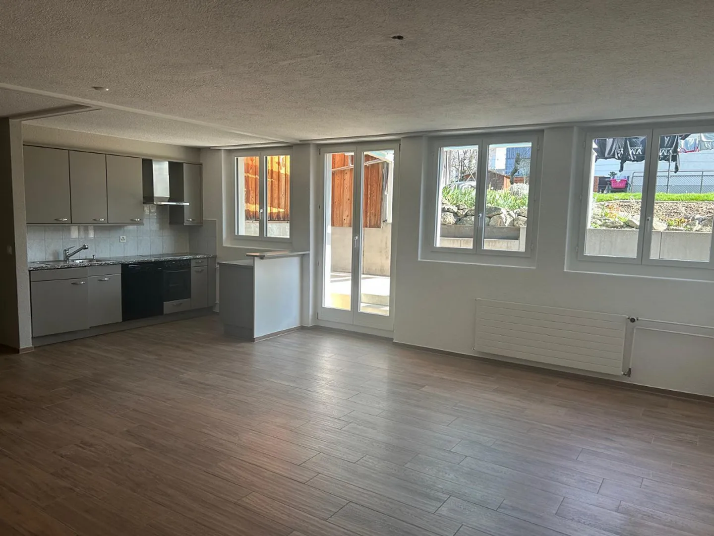 Appartamento 1,5 locali (UG) con terrazza giardino e padiglione in vetro - Foto 2 di 11