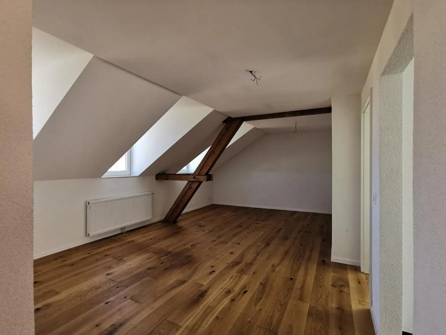 Appartement sous les combles lumineux de 3,5 pièces - Photo 3 sur 9