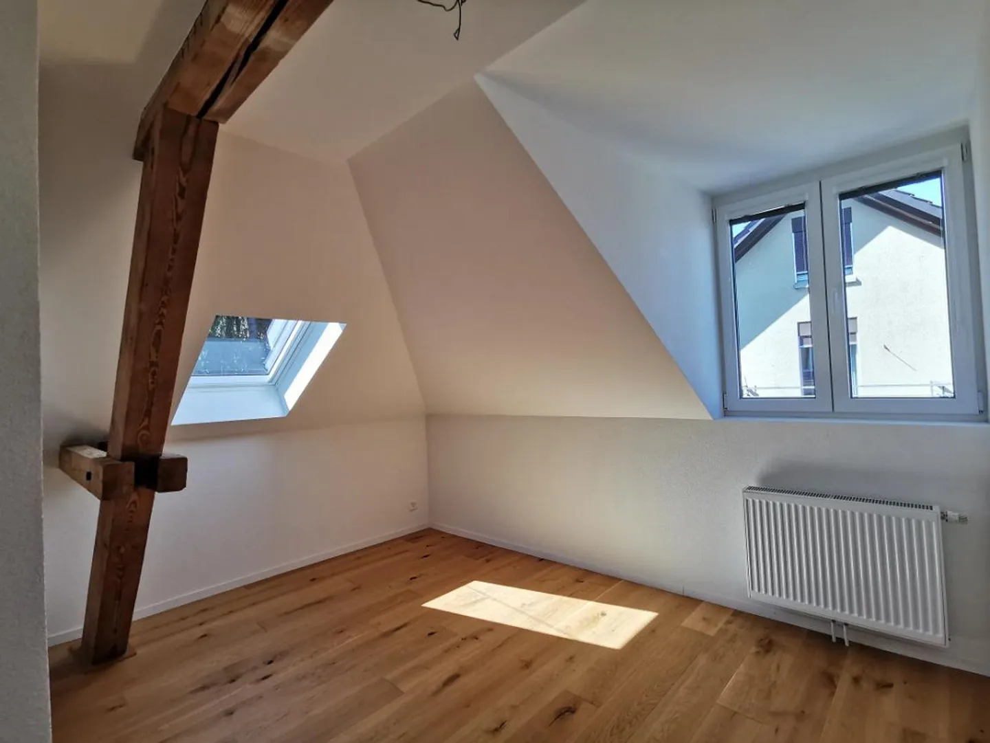 Appartement sous les combles lumineux de 3,5 pièces - Photo 7 sur 9